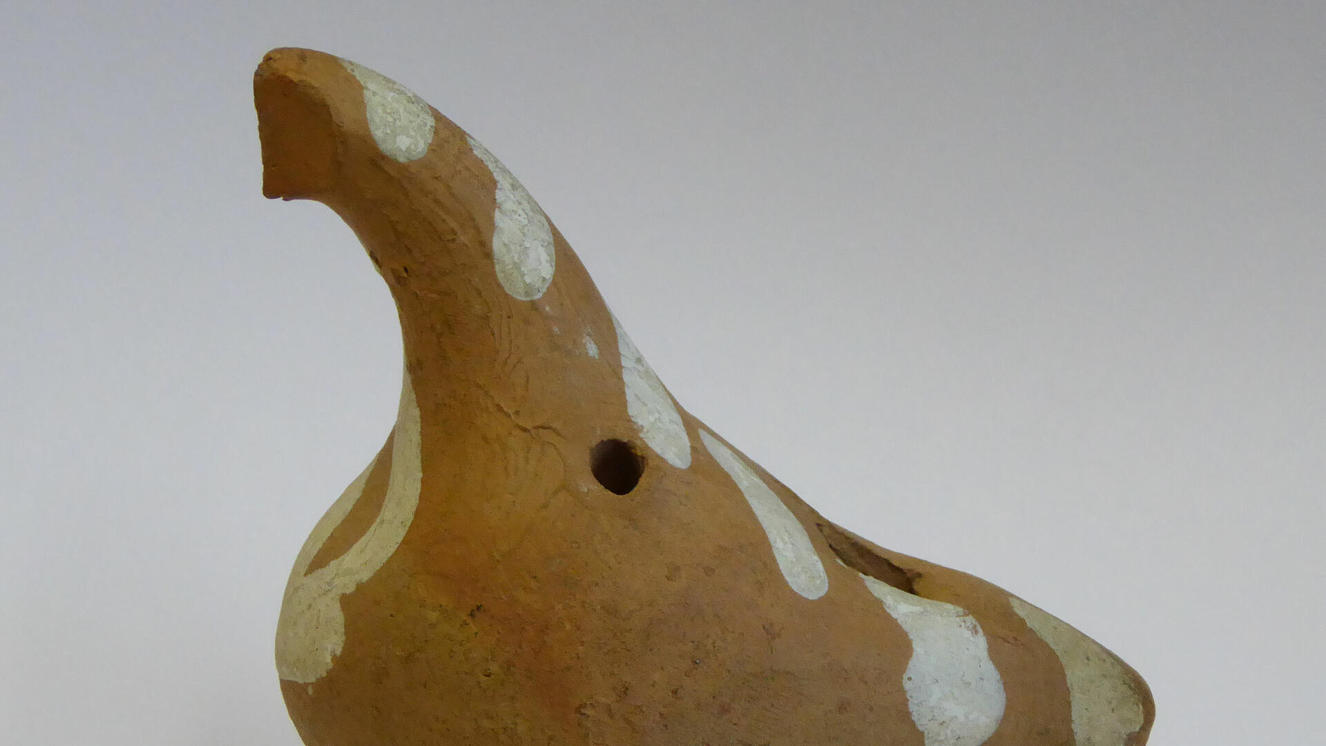 ruskea savinen kukkopilli