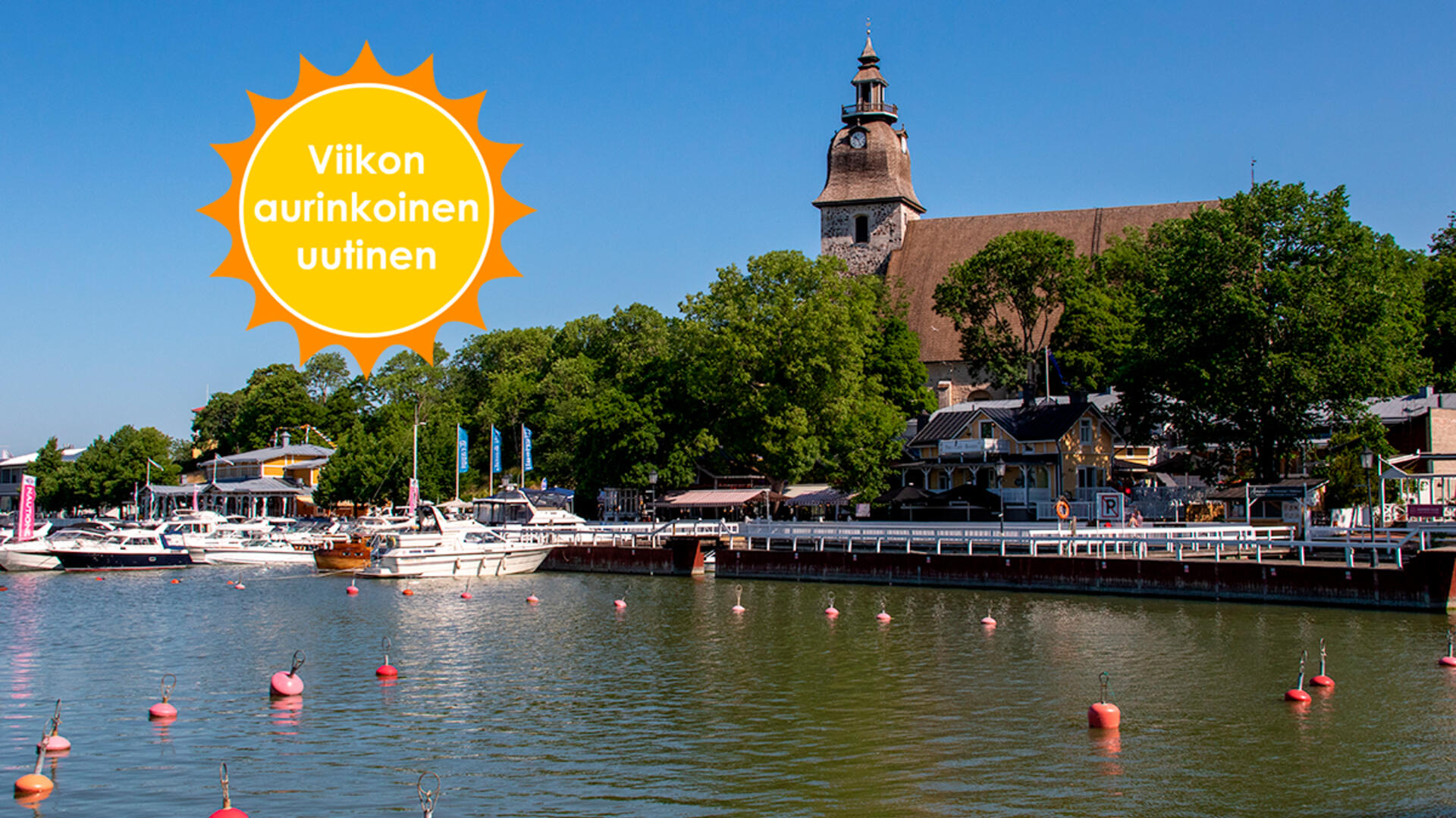 Viikon aurinkoinen uutinen -logo. Kesäinen Vanhankaupungin ranta.