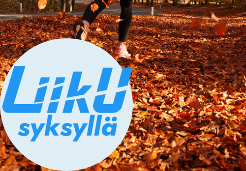 Lehtiä maassa, ihminen juoksee taustalla.