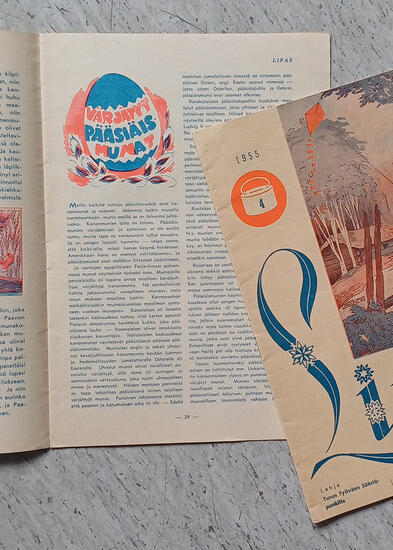 kaksi lehteä, joista toinen avattu